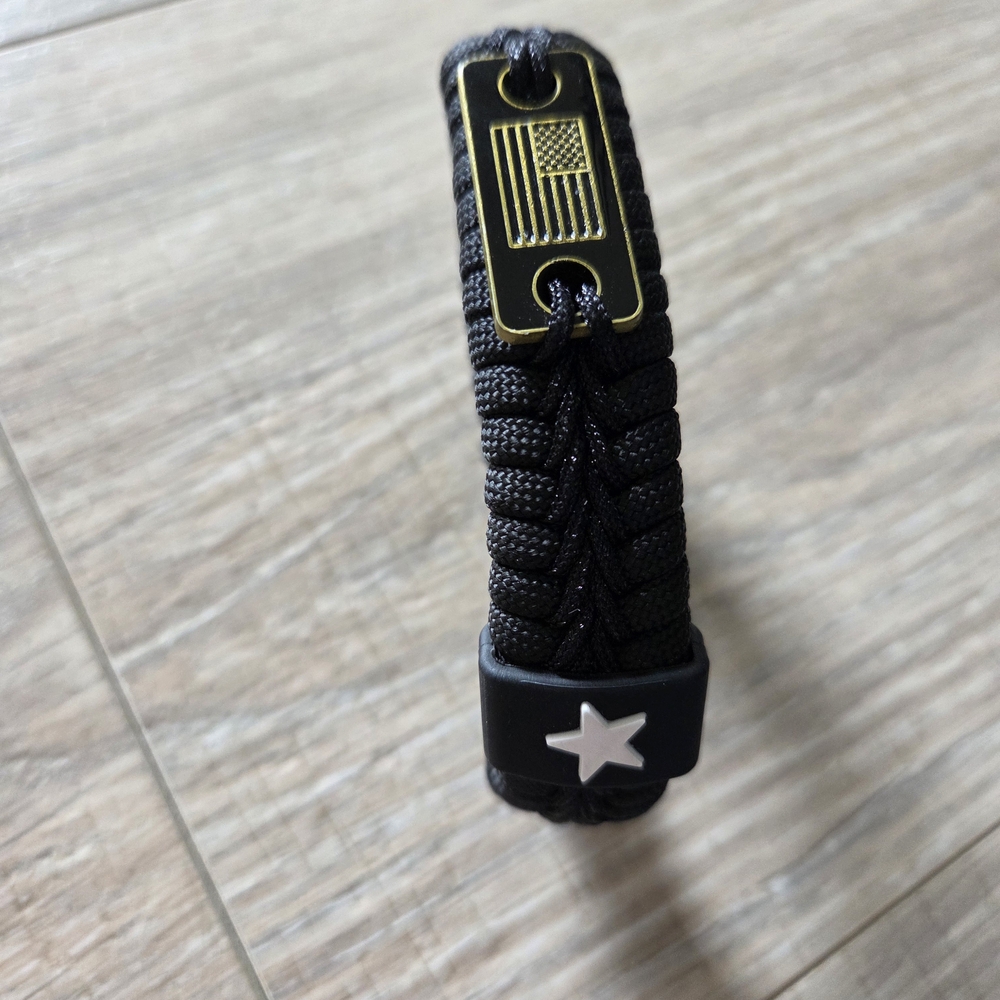 Black Paracord Bracelet with Gold and Silver Accents. Adjustable Length